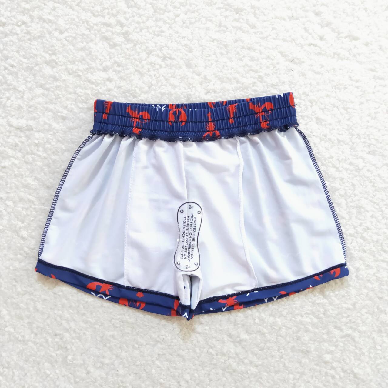 S0270 Red crayfish navy blue swim trunks
