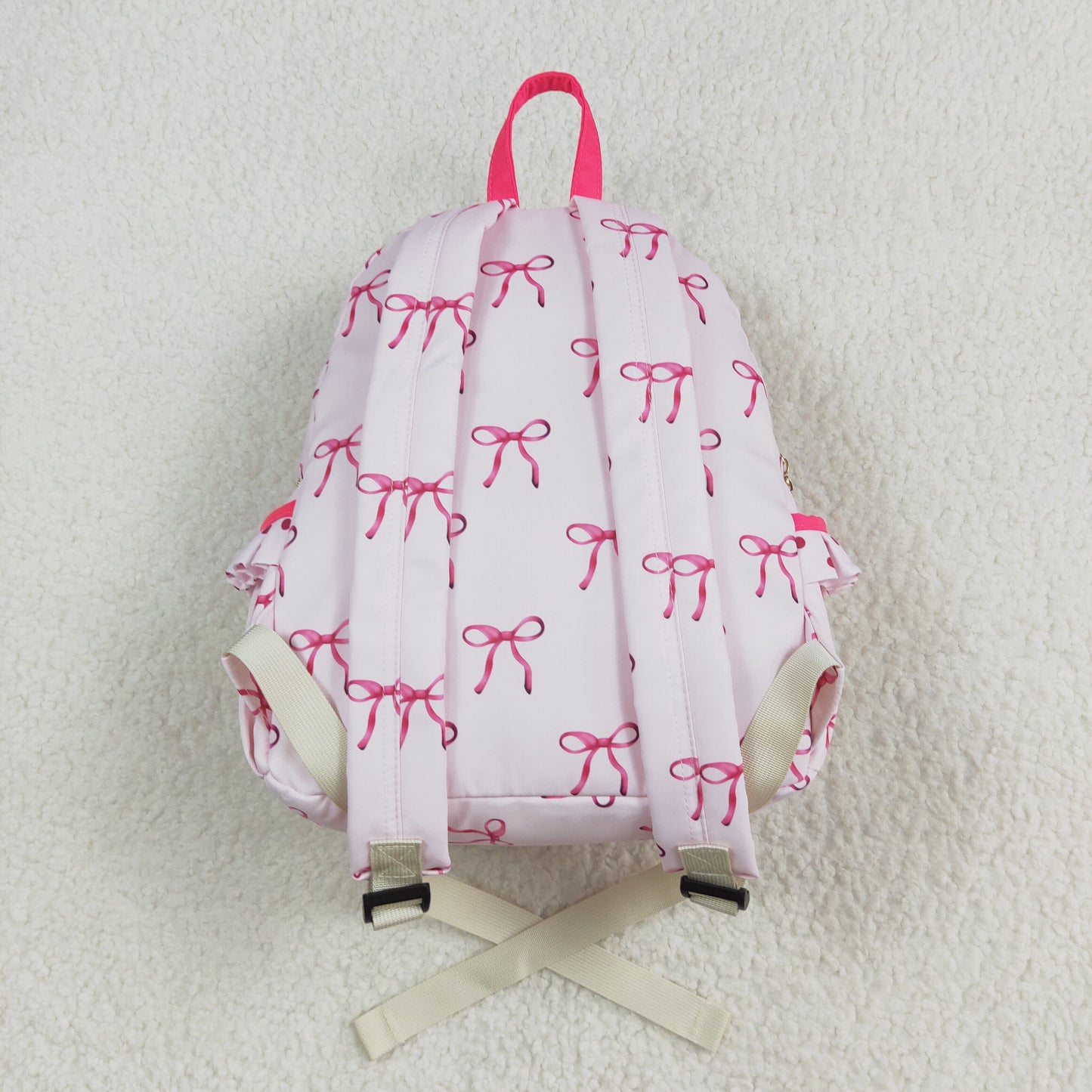 BA0233 Pink backpack with bow design