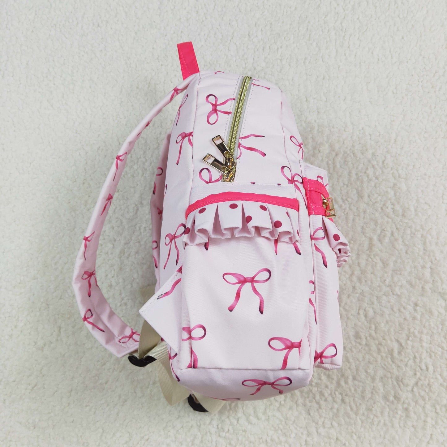 BA0233 Pink backpack with bow design