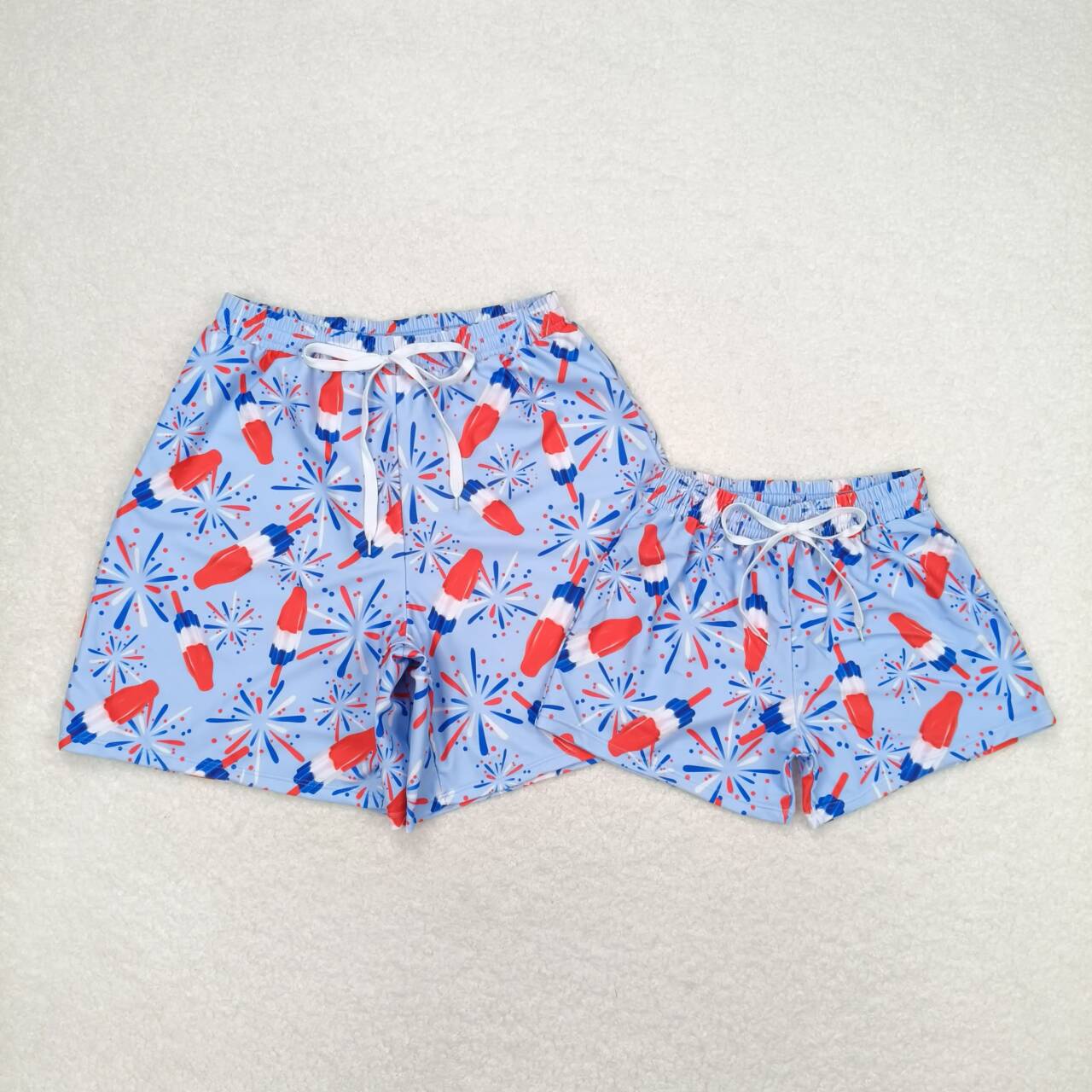 S0335 Adult male 4th of July firework Popsicle blue swimming trunks