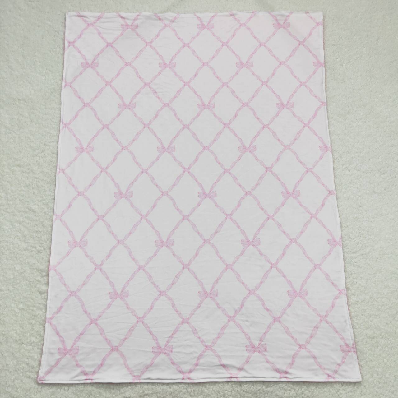 BL0132 Pink and white baby blanket with bow design